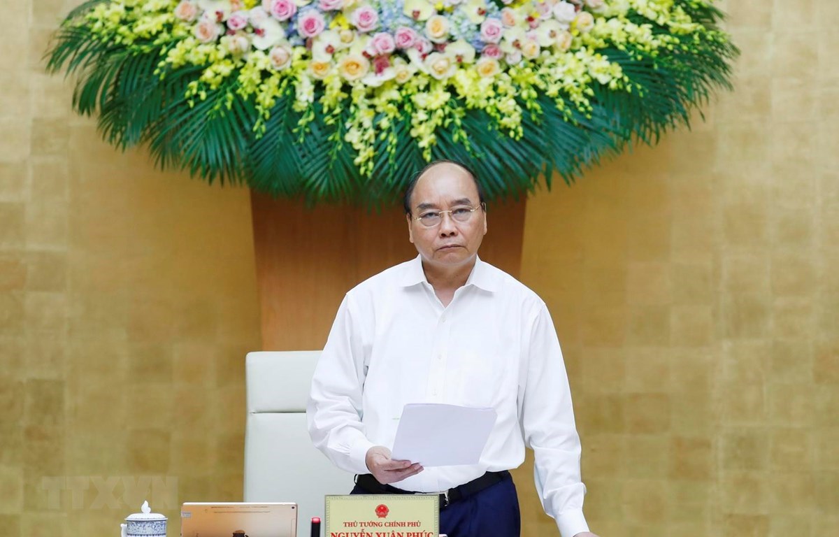 Премьер-министр Нгуен Суан выступает на заседании. (Тхонг Нят/ВИА)