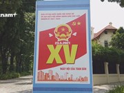 Столица Ханоя, украшенная флагами и цветами, готова к дню выборов