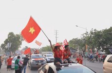 «Красные» болельщики сборной Вьетнама до 23 лет