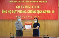 Вьетнамский союз организаций дружбы собирает средства для Фонда профилактики и контроля COVID-19