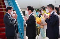 Генеральный секретарь, президент Лаоса прибыл во Вьетнам с официальным дружественным визитом