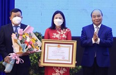 Президент Нгуен Суан Фук наградил орденом Труда уезд Кучи города Хошимин