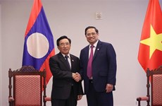 Премьер-министр Фам Минь Тьинь имел встречу с премьер-министром Лаоса в США
