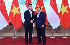 Премьер-министр Фам Минь Тьинь встретился со спикером парламента Сингапура