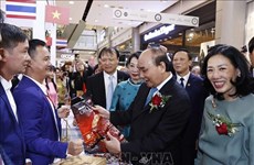 Президент принял участие в открытии Недели вьетнамских товаров в Таиланде 2022