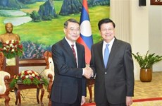 Руководитель Лаоса принял заведующего Канцелярией ЦК КПВ