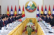 Премьер-министр Фам Минь Тьинь провел переговоры с премьер-министром Лаоса Сонексаем Сипандоне