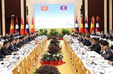 Премьер-министр Фам Минь Тьинь сопредседательствовал на 45-м заседании Вьетнамско-лаосской межправительственной комиссии