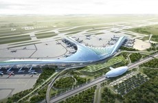 Рабочие будут работать на строительстве аэропорта Лонгтхань во время Тэт
