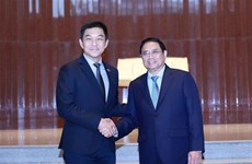 Премьер-министр Фам Минь Тьинь встретился со спикером парламента Сингапура Тан Чуан-Джином