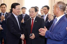 Президент предлагает поддержку вьетнамской общине в Лаосе