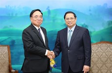 Премьер-министр Фам Минь Тьинь принял министра планирования и инвестиций Лаоса