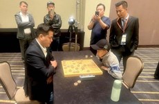 Вьетнамский игрок защищает чемпионство на мировом турнире в Сянци