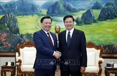 Высший руководитель Лаоса высоко оценил сотрудничество между Ханоем и Вьентьяном