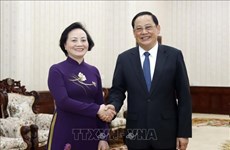Премьер-министр Лаоса приветствует сотрудничество министерств Вьетнама и Лаоса