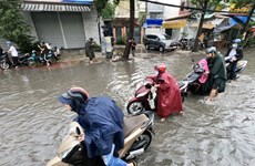 Город Хошимин отмечает значительное снижение затопления своих улиц во время сильных дождей