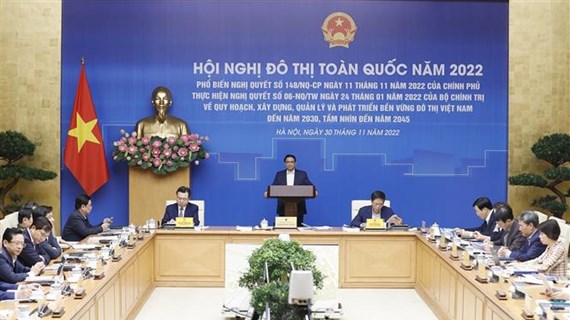 Премьер-министр Фам Минь Тьинь председательствует на Национальной конференции городов 2022 года