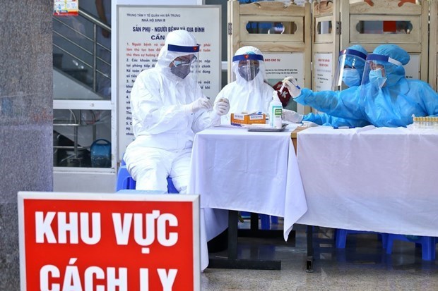 Во Вьетнаме выявили "британскии" штамм коронавируса – Усиление мер по профилактики эпидемии во время праздника Тэт hinh anh 1