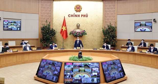 Год борьбы с COVID-19: Вьетнам превращает угрозы в угрозы hinh anh 8