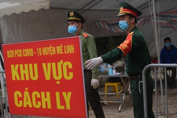 Год борьбы с COVID-19: Вьетнам превращает угрозы в угрозы hinh anh 1