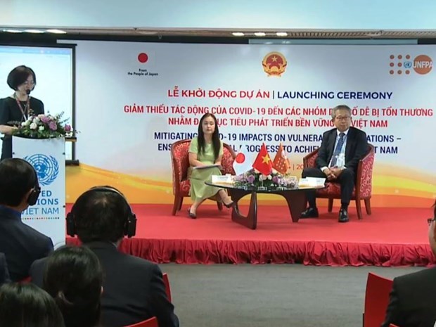 Поддержка в размере 65 млрд. донгов поможет Вьетнаму минимизировать негативное влияние COVID-19 hinh anh 1