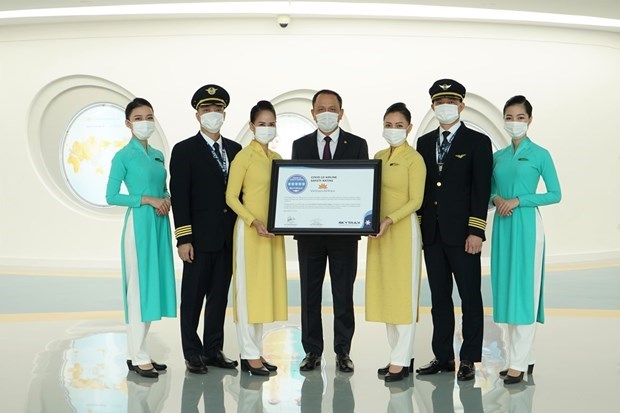 Vietnam Airlines получила сертификат 5 звезд за борьбу с COVID-19 hinh anh 2