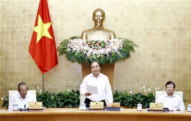 Премьер-министр Нгуен Суан Фук председательствовал на июльском очередном заседании Правительства ​ hinh anh 1