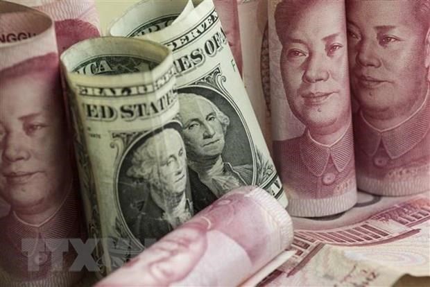 США исключили Китаи из списка валютных манипуляторов hinh anh 1