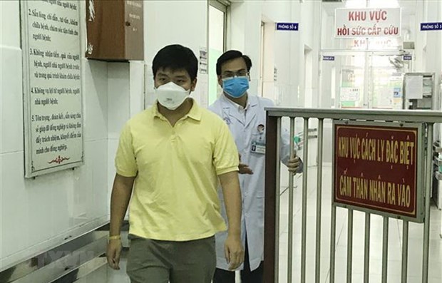 Острые респираторные инфекции, вызванные новым штаммом коронавируса: Первыи пациент выписан из больницы в Хошимине hinh anh 1