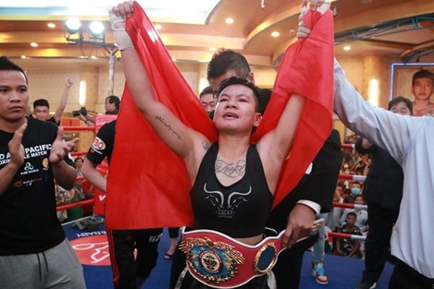 Вьетнамская боксерка впервые выиграла на WBO Asia Pacific hinh anh 1