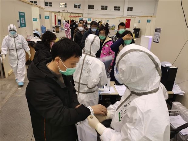 В Китае число жертв коронавируса достигло 2981 человека hinh anh 1