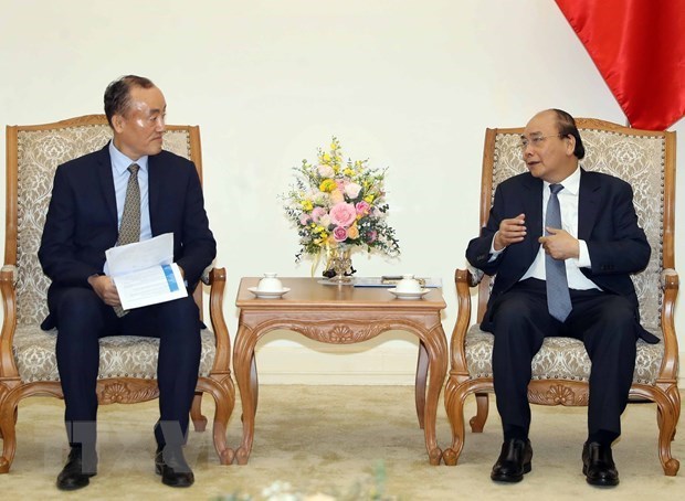 Премьер-министр: Вьетнам объединяет все ресурсы для борьбы с COVID-19 hinh anh 1