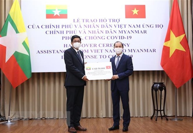 Вьетнам пожертвовал 50.000 долларов США Мьянме на борьбу с COVID-19 hinh anh 1
