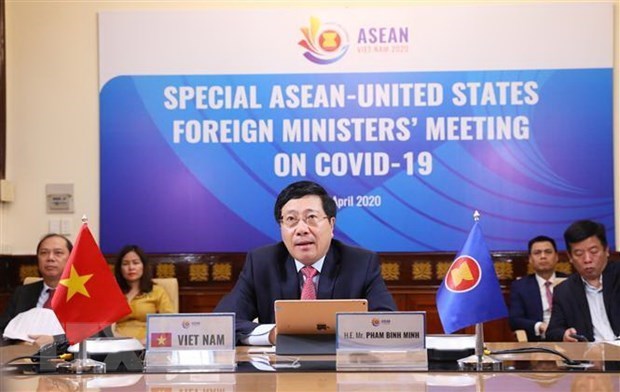 АСЕАН 2020: Вьетнам обещает сотрудничать с другими странами в борьбе с COVID-19 hinh anh 1