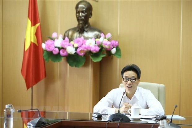 Вьетнам продолжает меры профилактики COVID-19 во время национальных праздников hinh anh 1