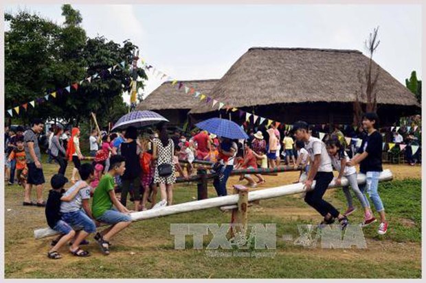 Мероприятия по случаю празднования вьетнамского Дня семьи в культурнои деревне hinh anh 1