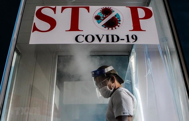 Юго-Восточная Азия по-прежнему регистрирует сотни новых случаев заражения COVID-19 hinh anh 1