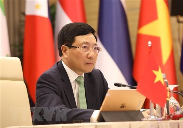 Послание вице-премьера-министра иностранных дел Фам Бинь Миня для второи Берлинскои конференции по климату и безопасности hinh anh 1