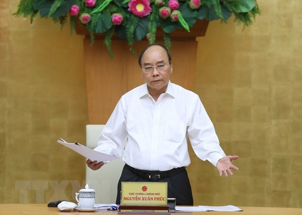 Премьер-министр провел совещание по ускорению выделения государственных инвестиции hinh anh 1