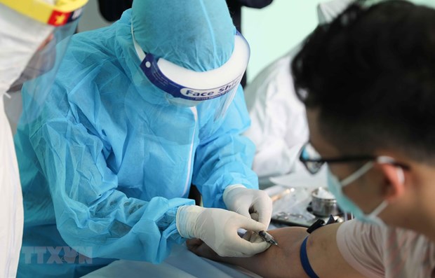 Вьетнам зафиксировал еще 5 новых случая COVID-19 в Куангнаме hinh anh 1