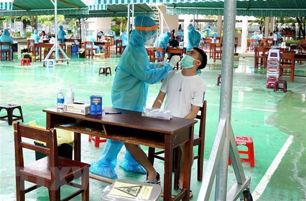 Вьетнам зарегистрировал новыи случаи COVID-19 связан со вспышкои в Дананге hinh anh 1