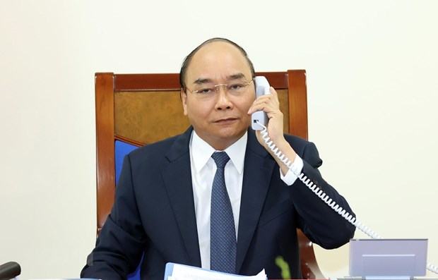 Премьер-министр Вьетнама и канцлер Германии провели телефонные переговоры hinh anh 1