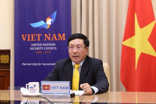 Заместитель премьер-министра и министр иностранных дел Фам Бинь Минь выступил с речью на дебатах на высшем уровне Совета Безопасности Организации Объединенных Нации hinh anh 1