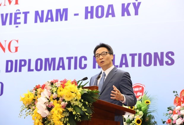 Церемония в Ханое празднует 25-летия установления дипломатических отношении между США и Вьетнамом hinh anh 1