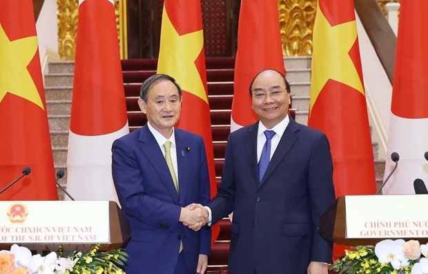 Япония продолжает тесное сотрудничество с Вьетнамом в борьбе с COVID-19 hinh anh 1
