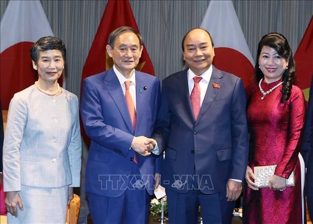 Японские СМИ освещают визит премьер-министра Суги Иосихиде во Вьетнам hinh anh 1