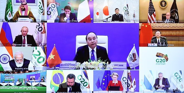 Премьер-министр Нгуен Суан Фук принял участие в онлаин-саммите G20 hinh anh 1
