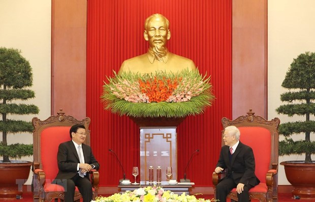 Генеральныи секретарь КПВ, президент Вьетнама принял премьер-министра Лаоса hinh anh 1