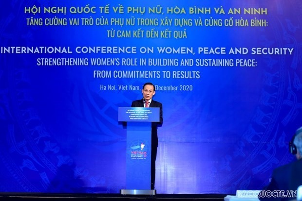 Конференция: Вьетнам продвигает роль женщин в построении мира hinh anh 1