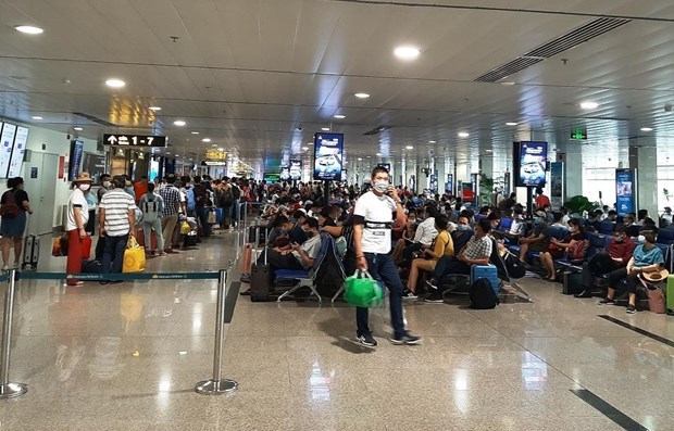 Vietnam Airlines просит пассажиров заполнять обязательную медицинскую декларацию hinh anh 1